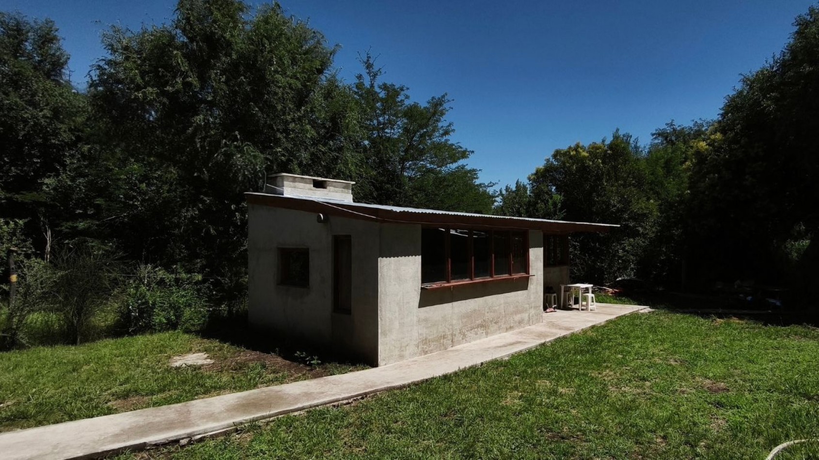 Venta de Casa Container con quincho cerrado en Villa Ciudad Parque - Calamuchita. Con escritura