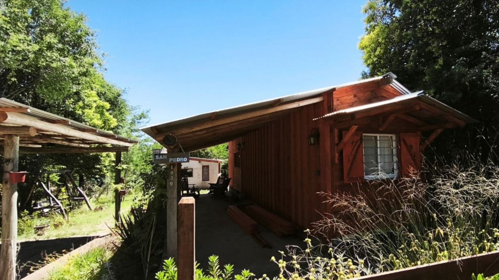 Venta de Casa Container con quincho cerrado en Villa Ciudad Parque - Calamuchita. Con escritura